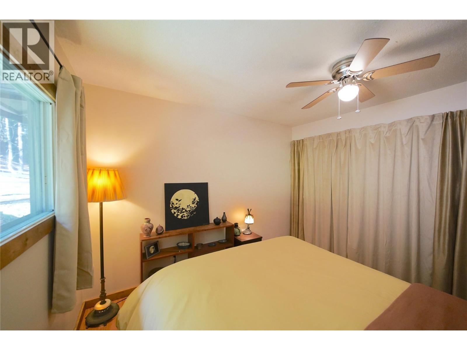 281 Iwanik Road, Procter, BC - Indoor Photo Showing Bedroom