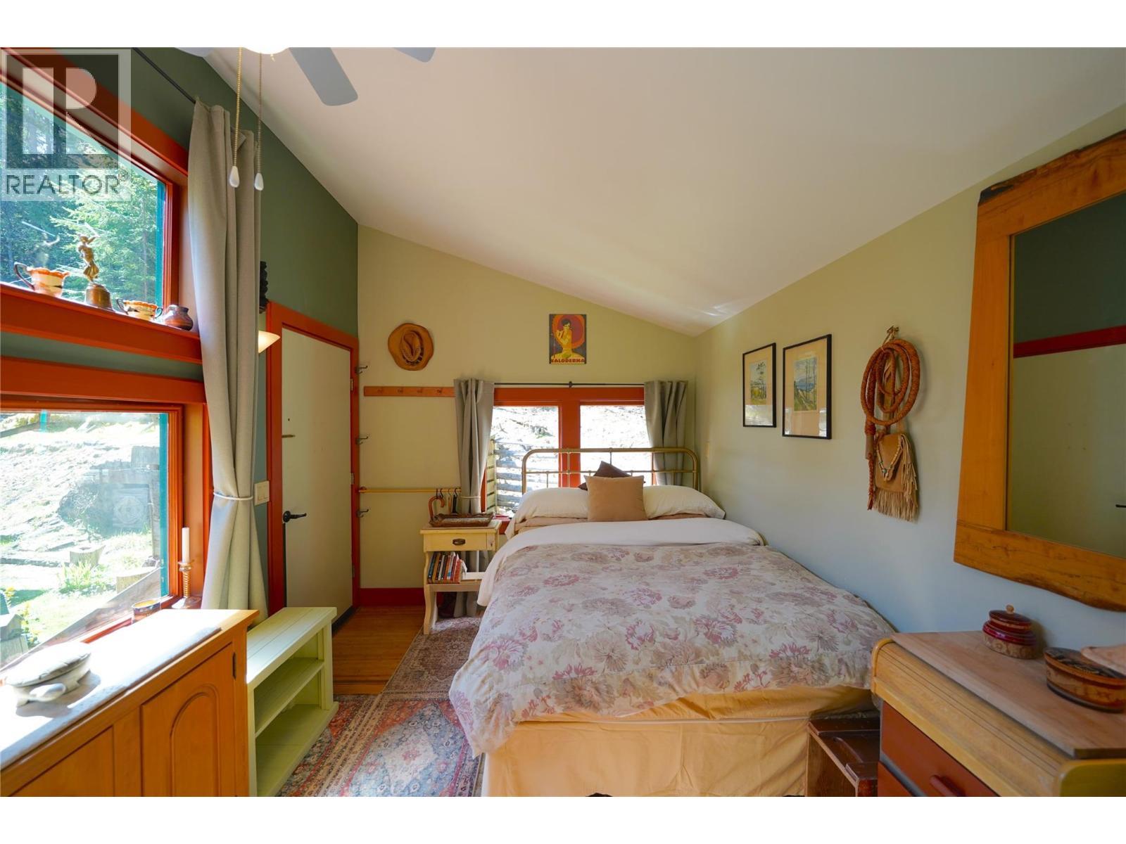 281 Iwanik Road, Procter, BC - Indoor Photo Showing Bedroom