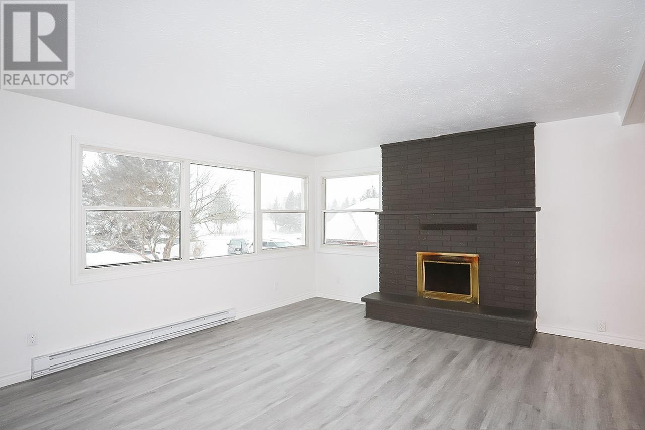 826 I Line Rd, Richards Landing, ON - Indoor Photo Showing Living Room With Fireplace