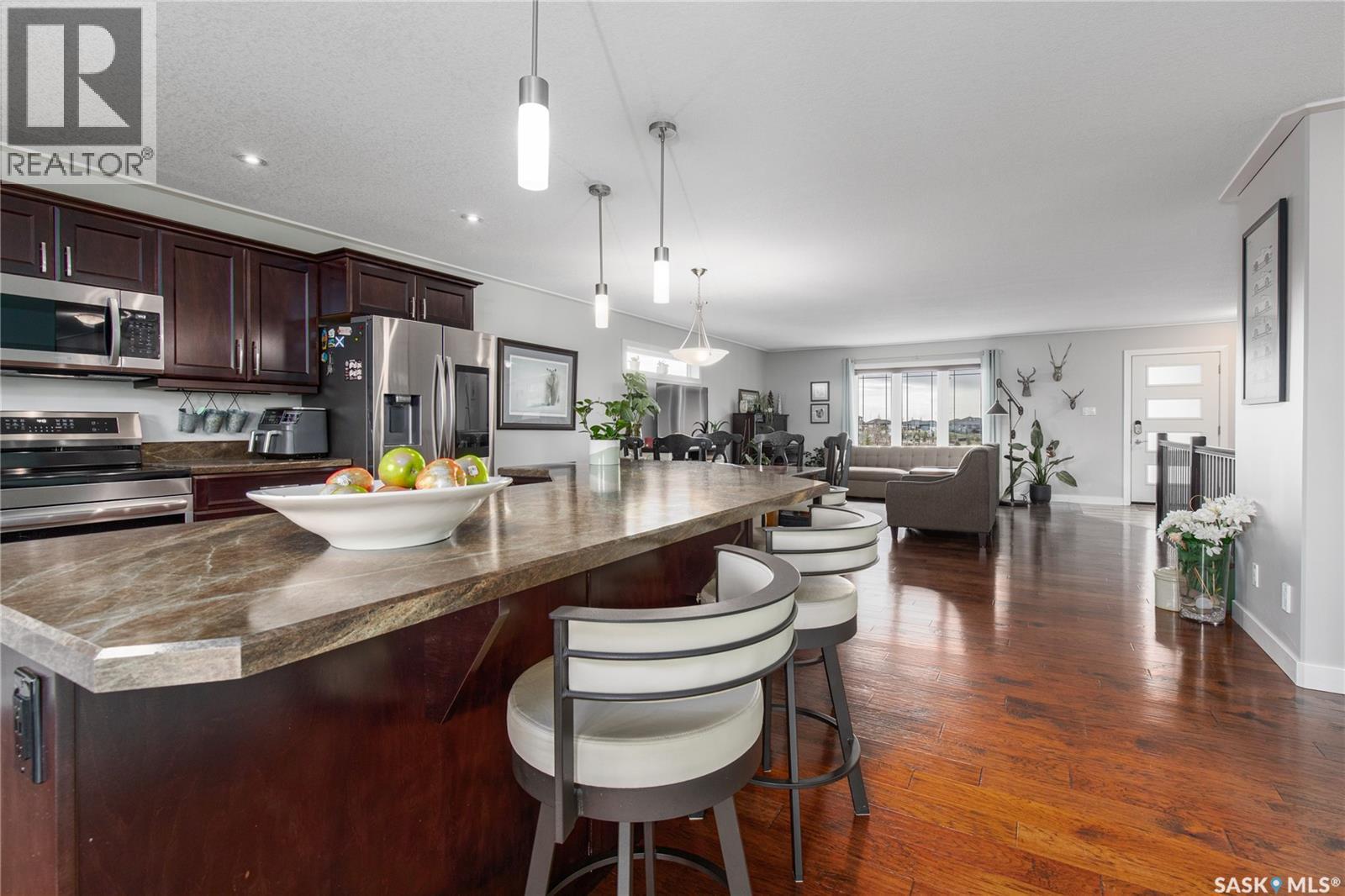 212 Iron Bridge Drive, Moose Jaw, SK - Indoor Photo Showing Kitchen With Upgraded Kitchen