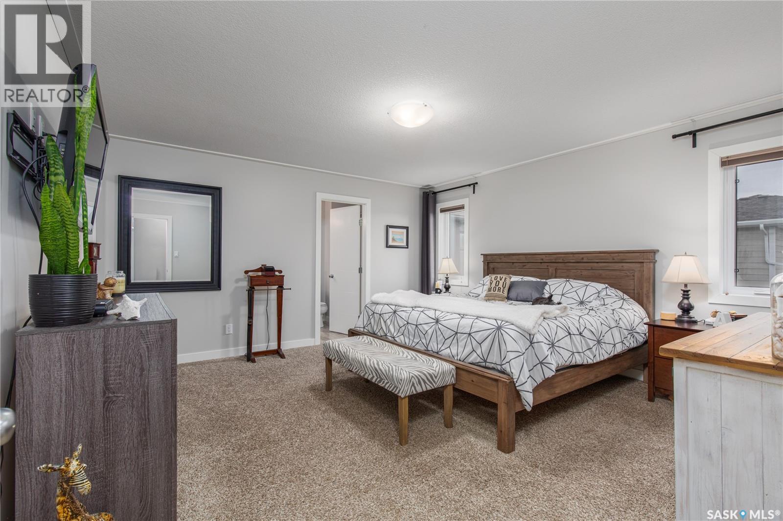 212 Iron Bridge Drive, Moose Jaw, SK - Indoor Photo Showing Bedroom