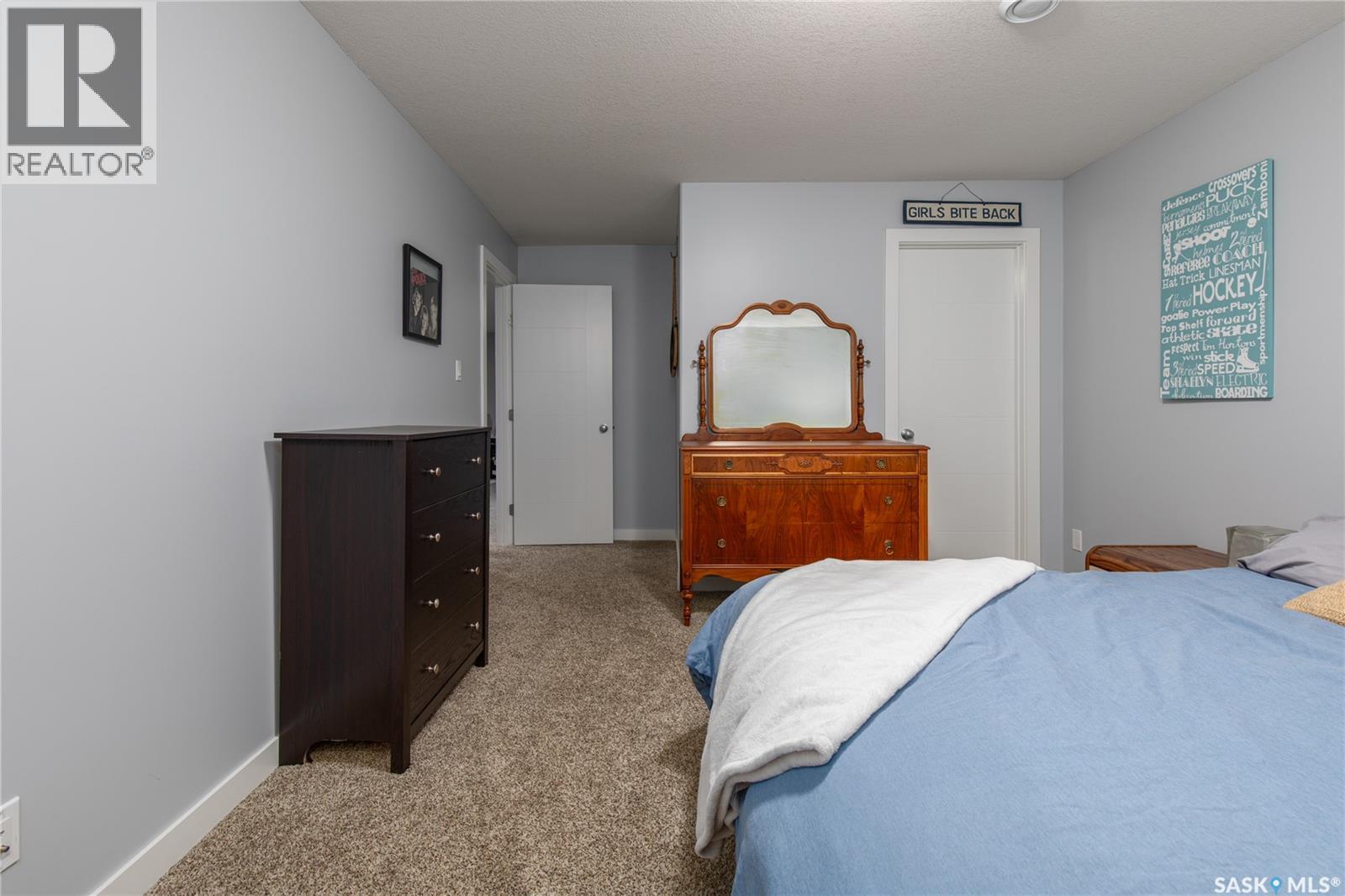 212 Iron Bridge Drive, Moose Jaw, SK - Indoor Photo Showing Bedroom