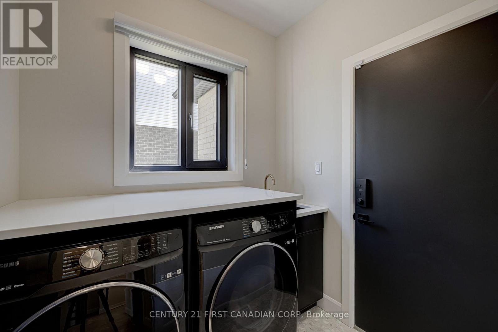 133 Basil Crescent, Middlesex Centre (Ilderton), ON - Indoor Photo Showing Laundry Room