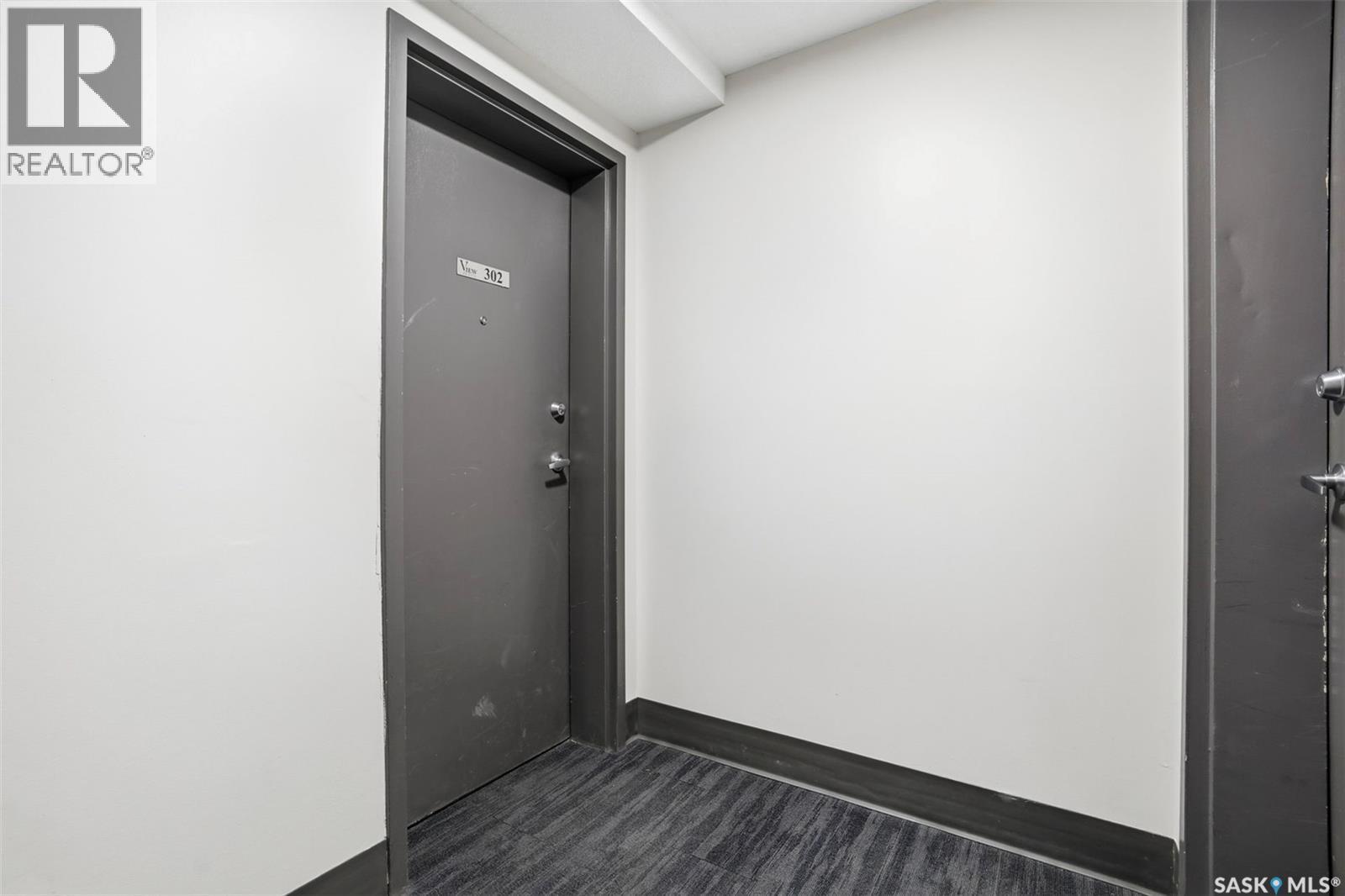 302 320 5Th Avenue N, Saskatoon, SK - Indoor Photo Showing Other Room