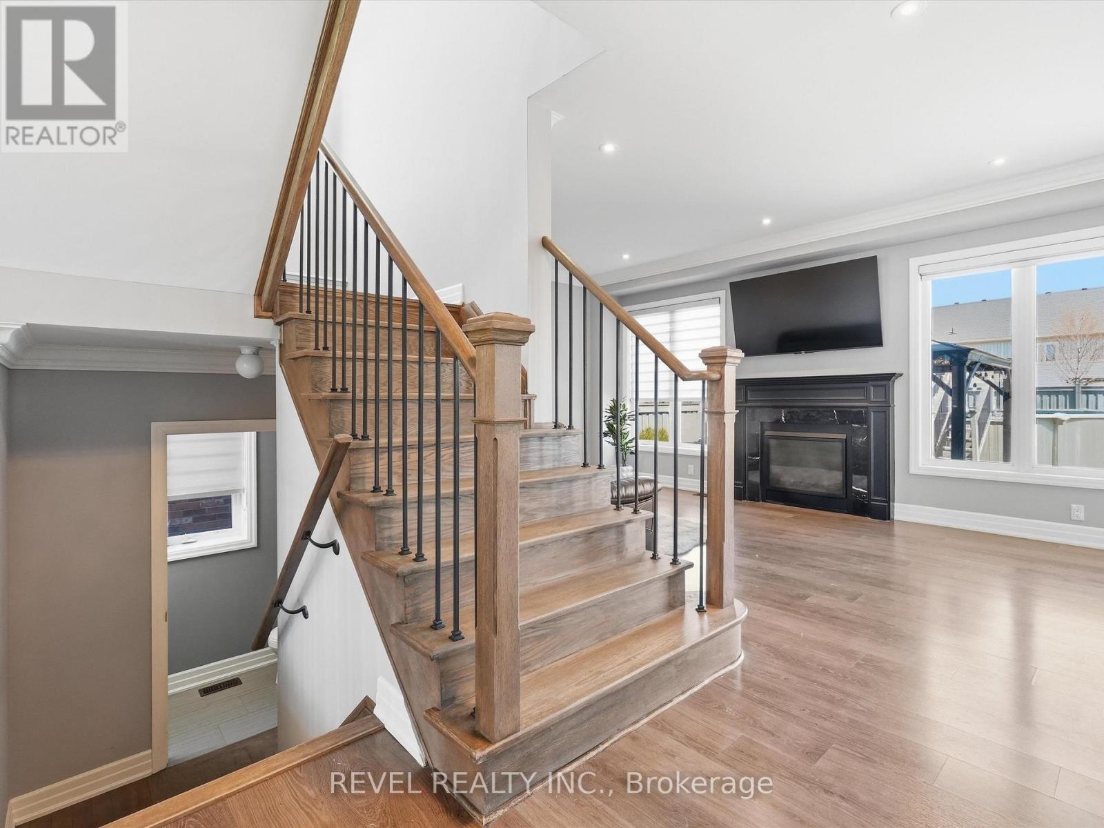 17 Mount Crescent, Essa, ON - Indoor Photo Showing Other Room With Fireplace