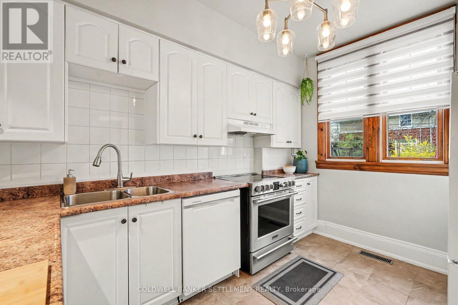 Custom privacy blinds. - 1 Burchell Boulevard, Perth, ON - Indoor Photo Showing Kitchen With Double Sink