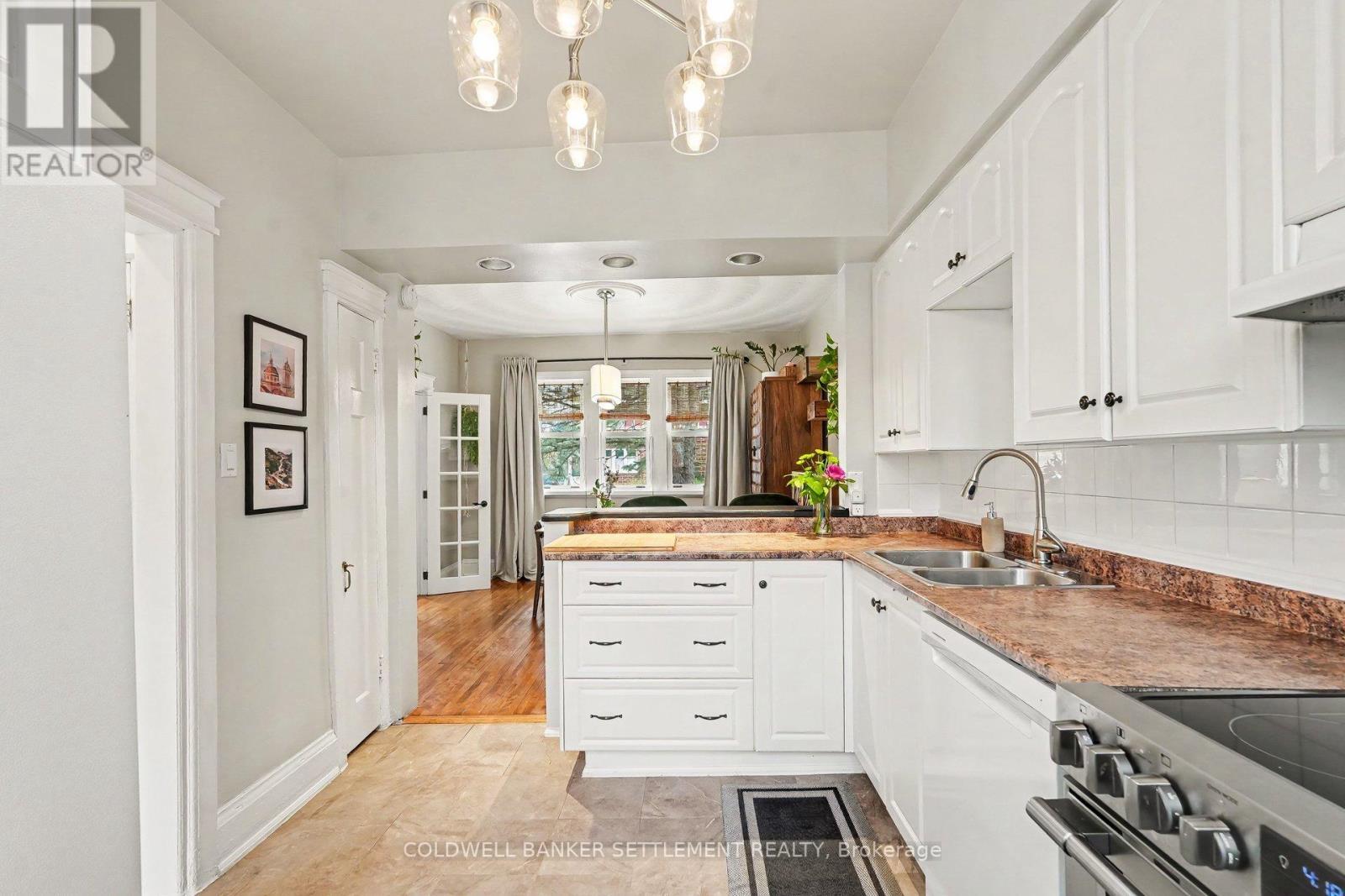 Renovated kitchen; plenty of cupboards & counter. - 1 Burchell Boulevard, Perth, ON - Indoor Photo Showing Kitchen With Double Sink