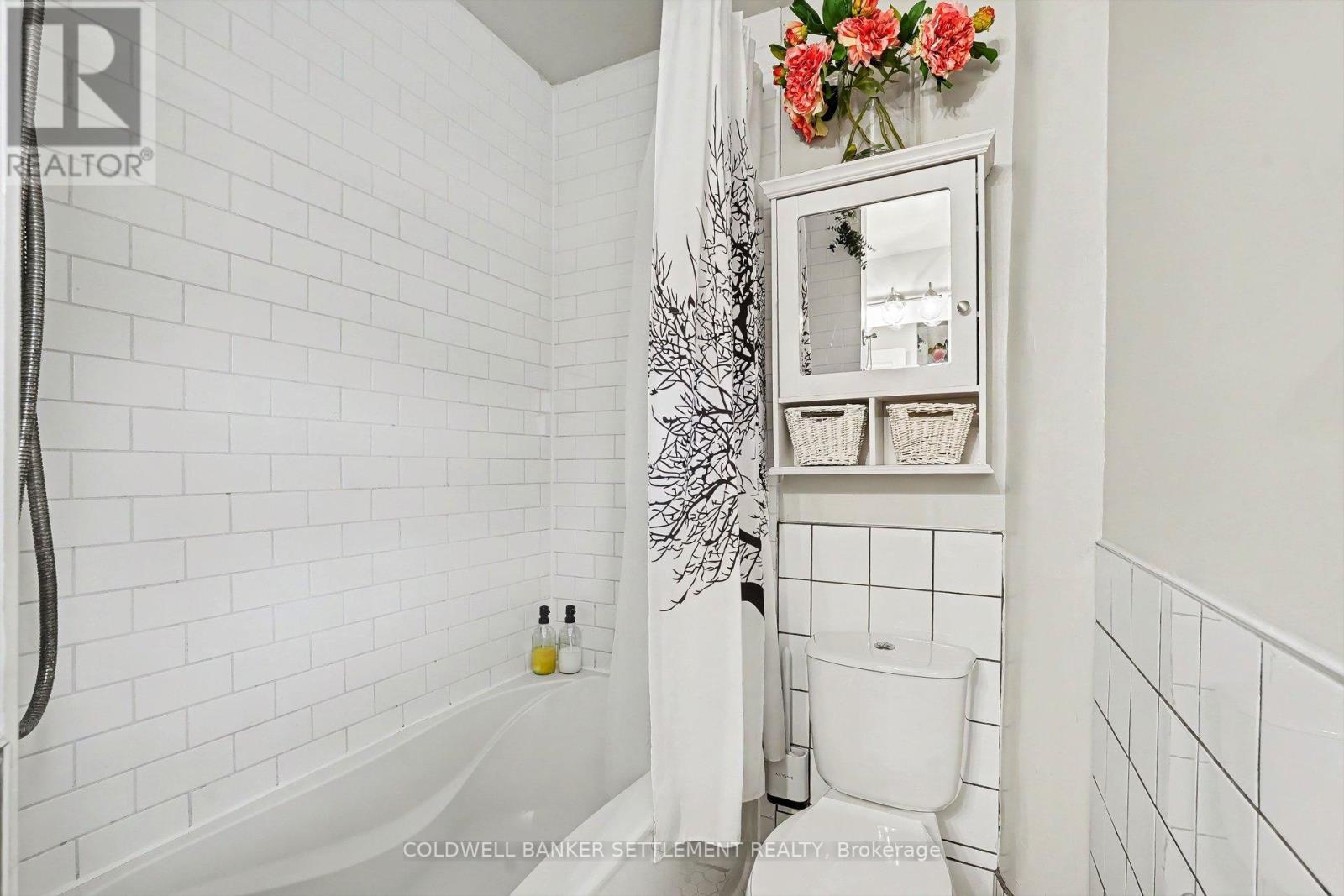 Renovated main bathroom with soaker tub/shower. - 1 Burchell Boulevard, Perth, ON - Indoor Photo Showing Bathroom