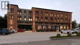 Develpment Plans - Modern multi-story building featuring brick and panel facades, large windows, and ground-level retail spaces with expansive glass storefronts - 3052 New Street, Burlington, ON