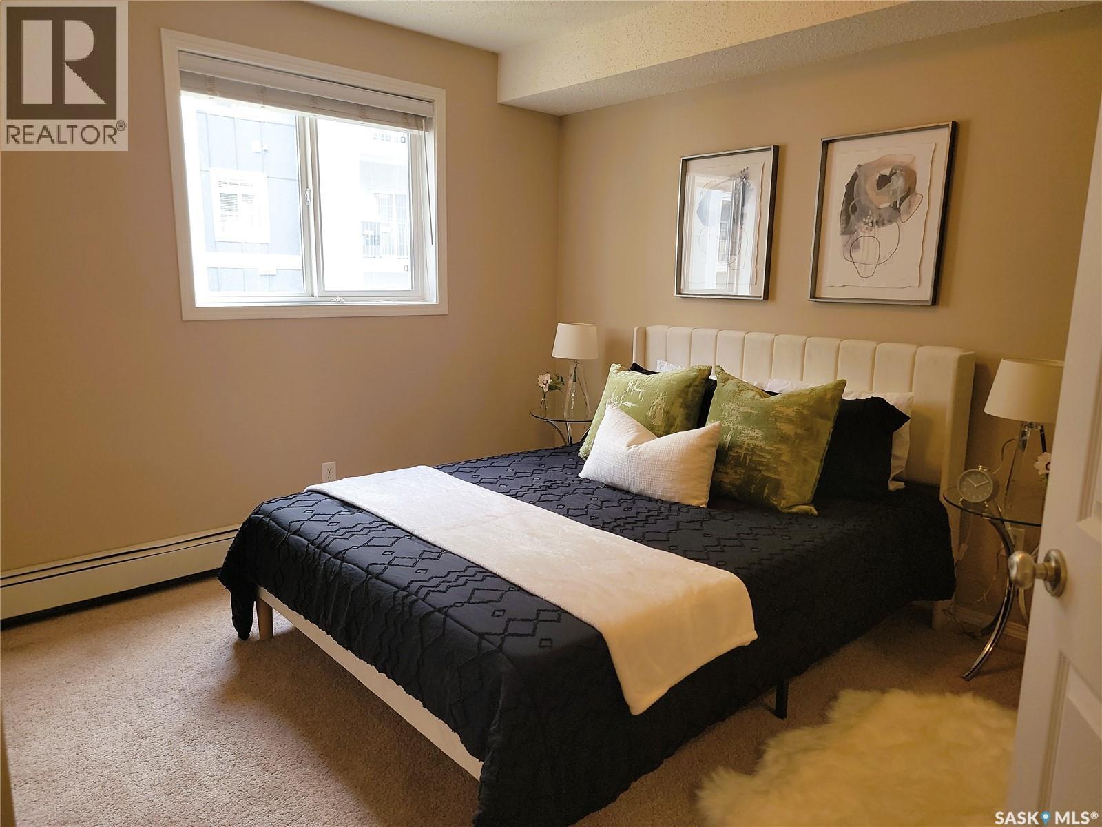 204 303 Lowe Road, Saskatoon, SK - Indoor Photo Showing Bedroom