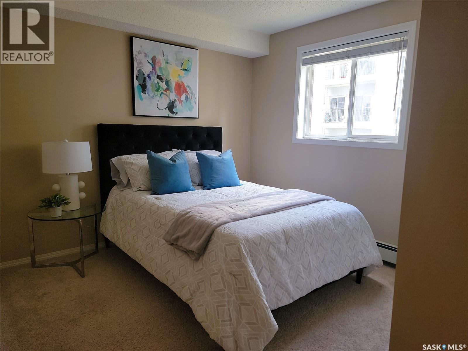 204 303 Lowe Road, Saskatoon, SK - Indoor Photo Showing Bedroom
