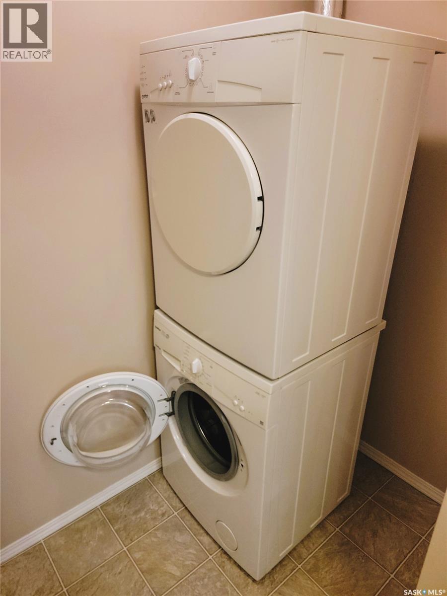 204 303 Lowe Road, Saskatoon, SK - Indoor Photo Showing Laundry Room