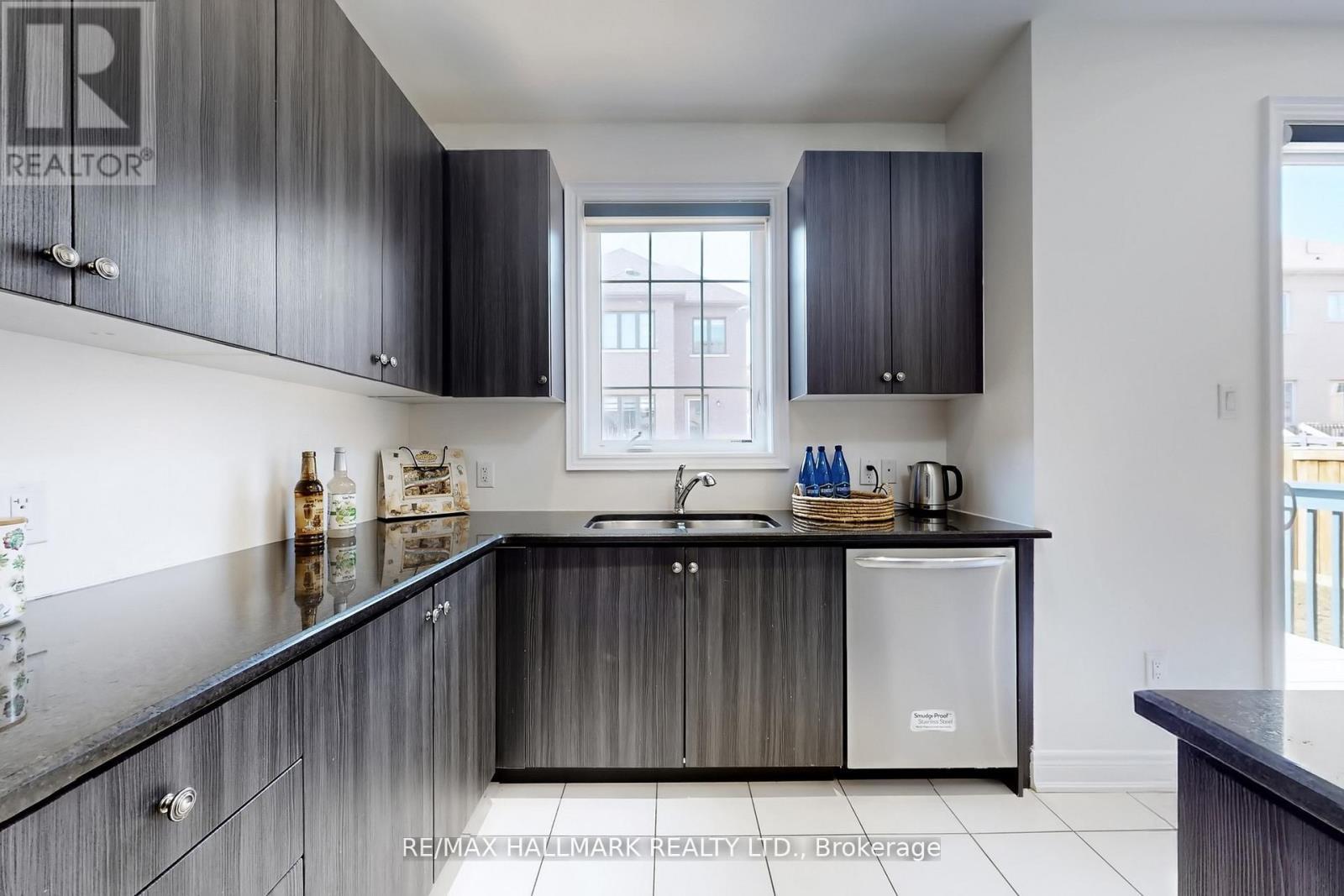 9 Lyle Way E, Brampton, ON - Indoor Photo Showing Kitchen With Double Sink