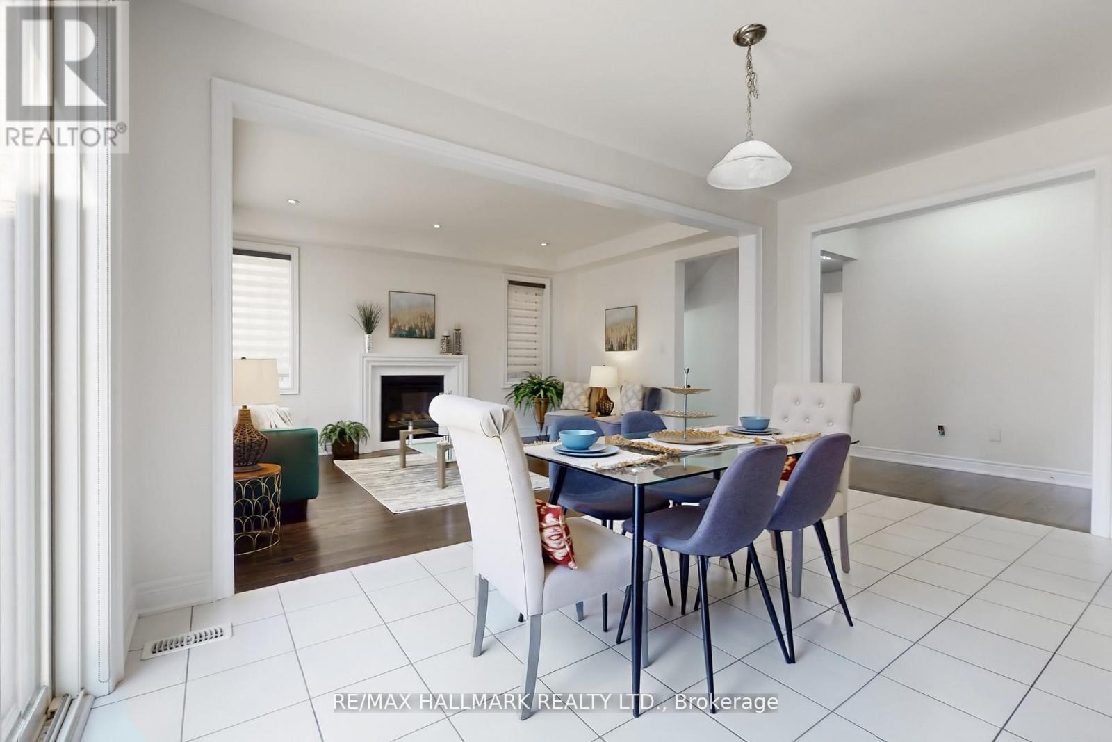 9 Lyle Way E, Brampton, ON - Indoor Photo Showing Dining Room With Fireplace