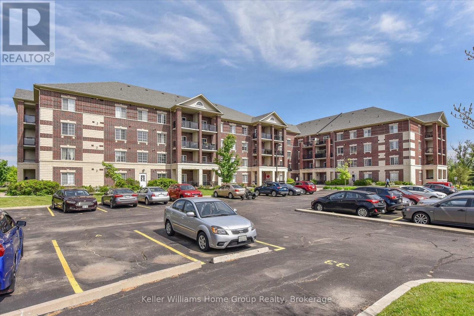 114 - 308 Watson Parkway N, Guelph (Grange Road), ON - Outdoor With Balcony With Facade