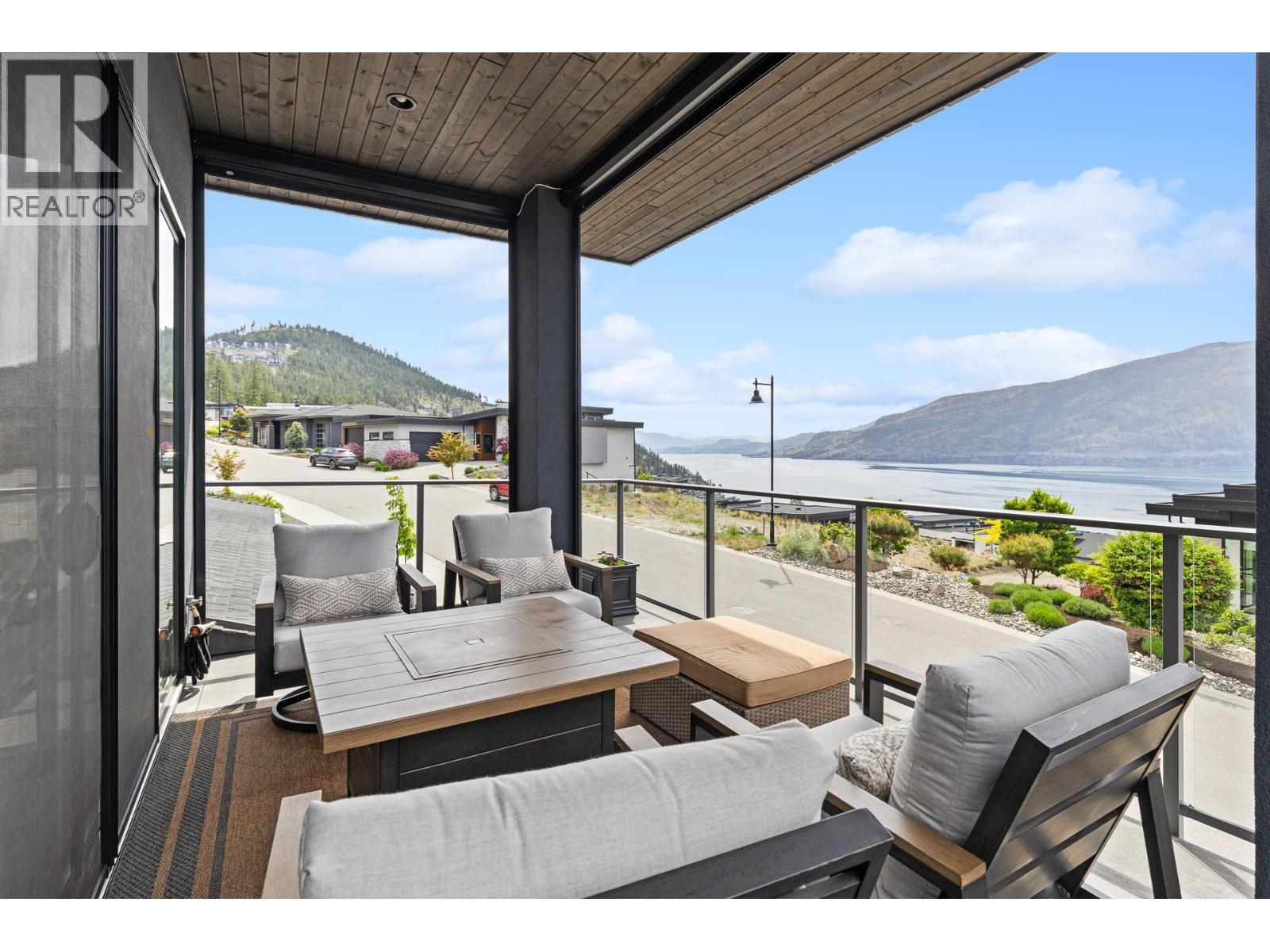 3643 Wild Rose Road, Kelowna, BC - Outdoor With Body Of Water With Deck Patio Veranda With View With Exterior