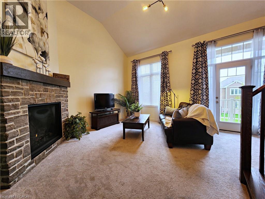 Second view of the family room - 259 Grovehill Crescent, Kitchener, ON - Indoor Photo Showing Living Room With Fireplace