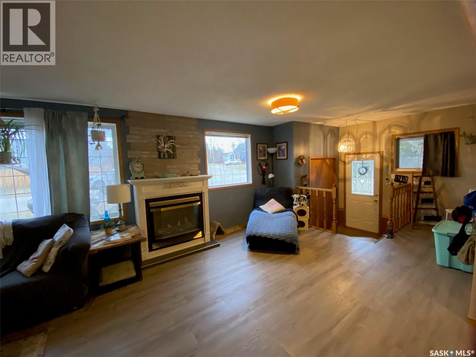 515 Springs Avenue, Springside, SK - Indoor Photo Showing Living Room With Fireplace