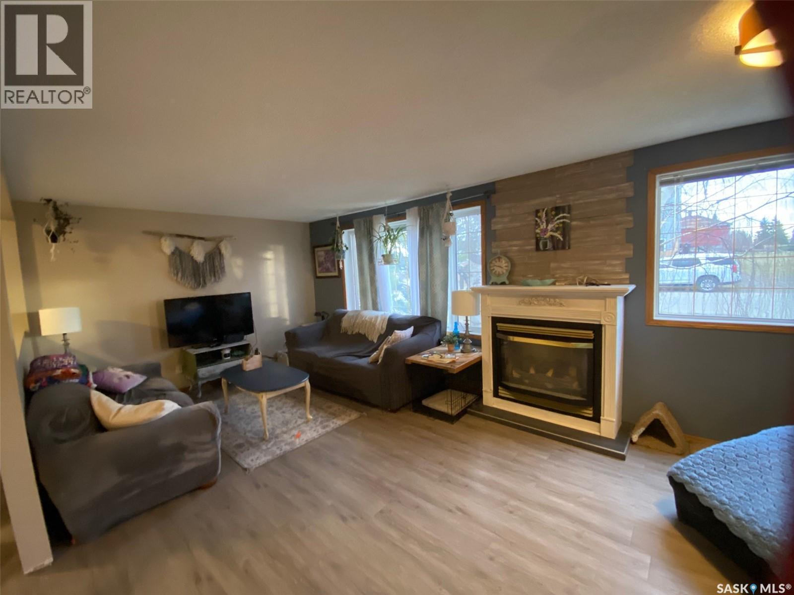 515 Springs Avenue, Springside, SK - Indoor Photo Showing Living Room With Fireplace