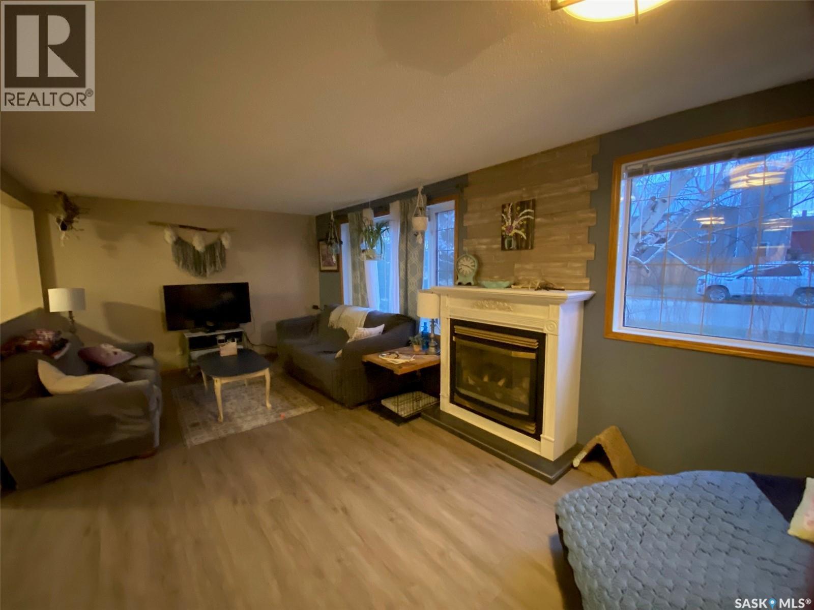 515 Springs Avenue, Springside, SK - Indoor Photo Showing Living Room With Fireplace