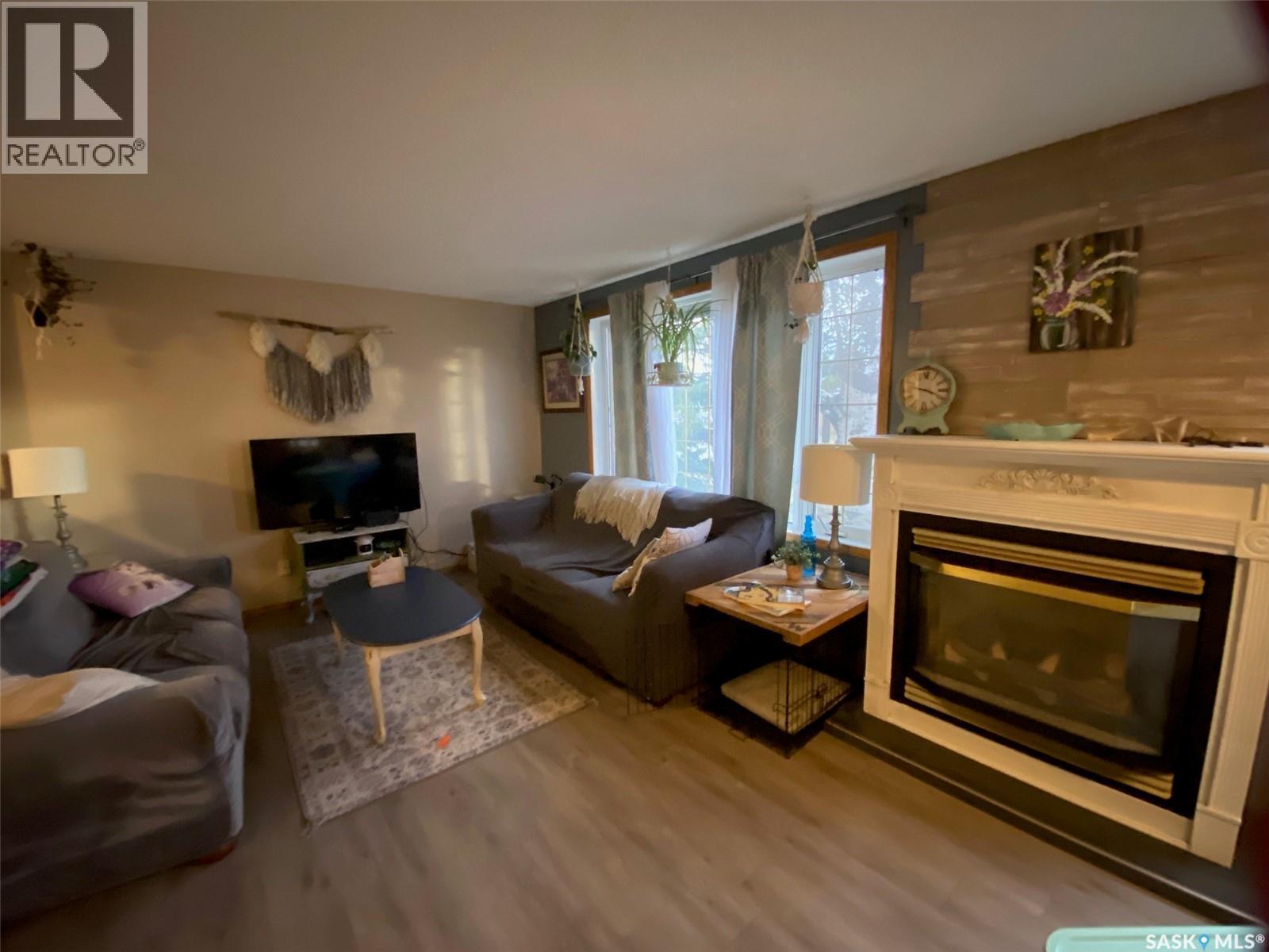 515 Springs Avenue, Springside, SK - Indoor Photo Showing Living Room With Fireplace