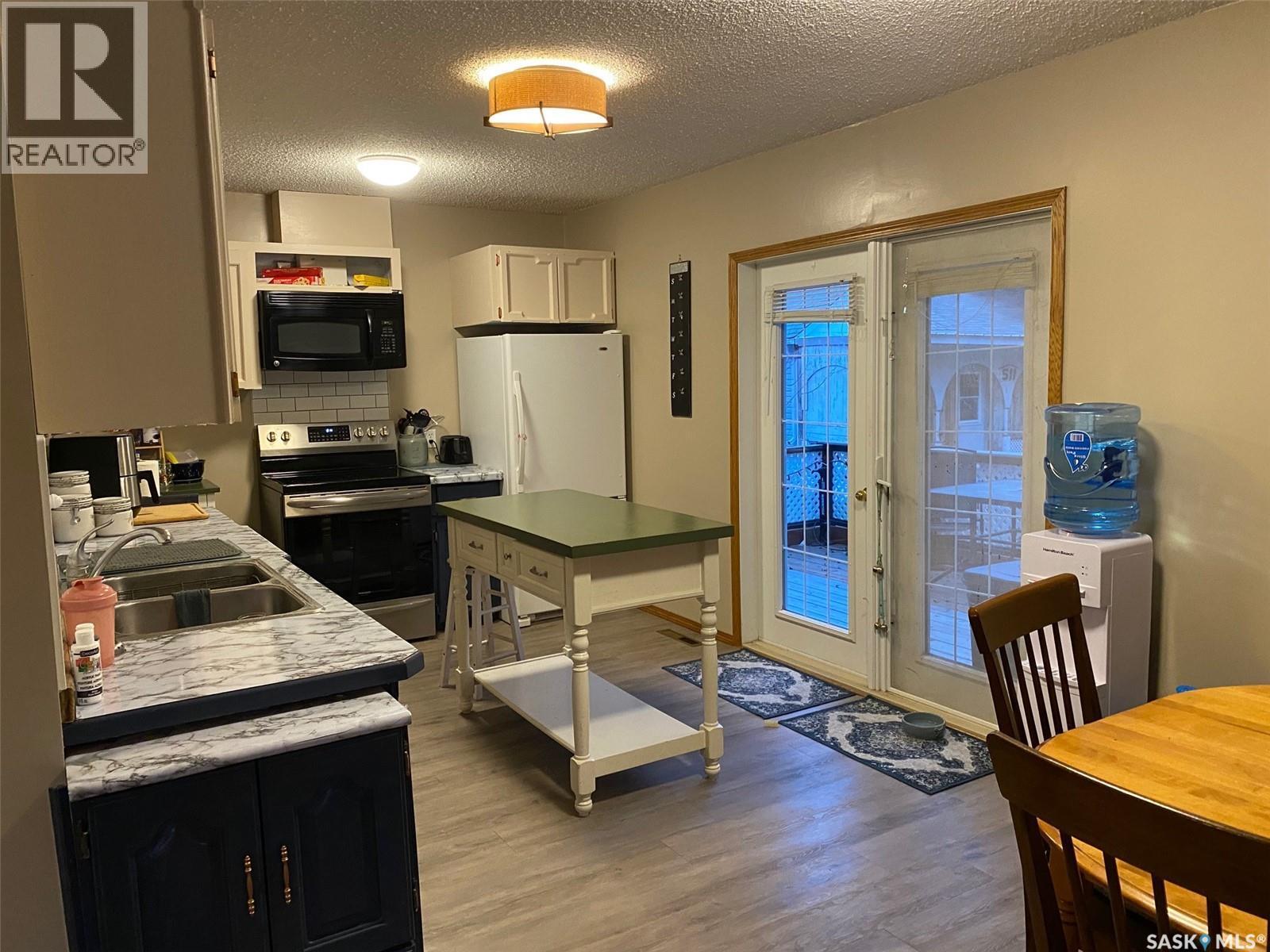515 Springs Avenue, Springside, SK - Indoor Photo Showing Kitchen With Double Sink