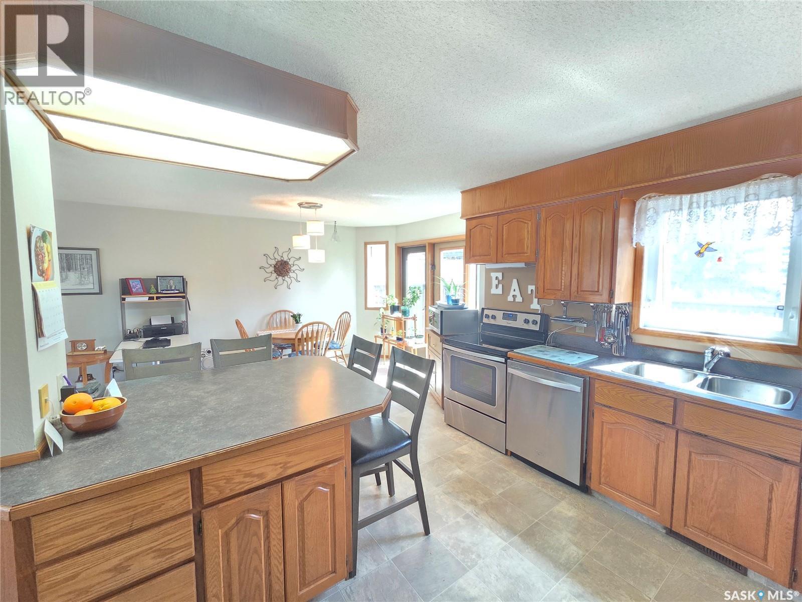509 Carlyle Avenue, Carlyle, SK - Indoor Photo Showing Kitchen With Double Sink