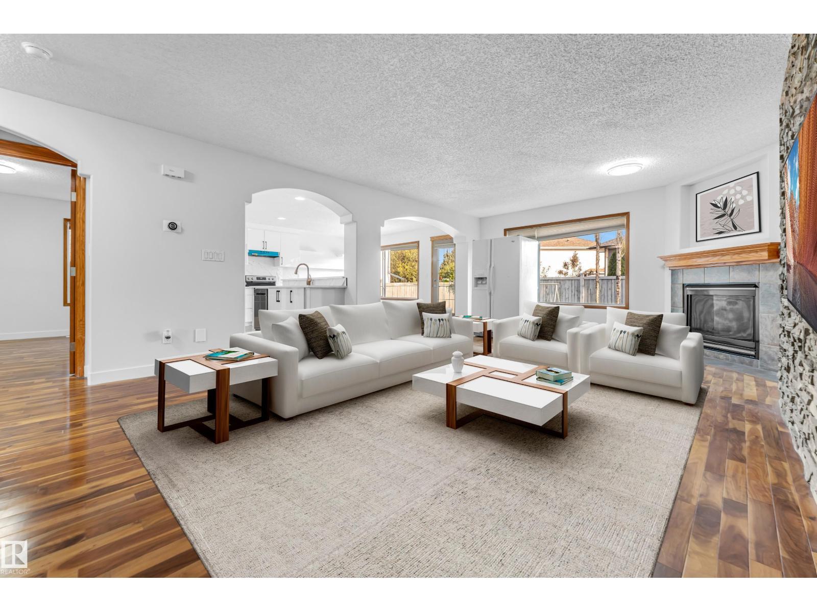 10621 175A Av Nw, Edmonton, AB - Indoor Photo Showing Living Room With Fireplace