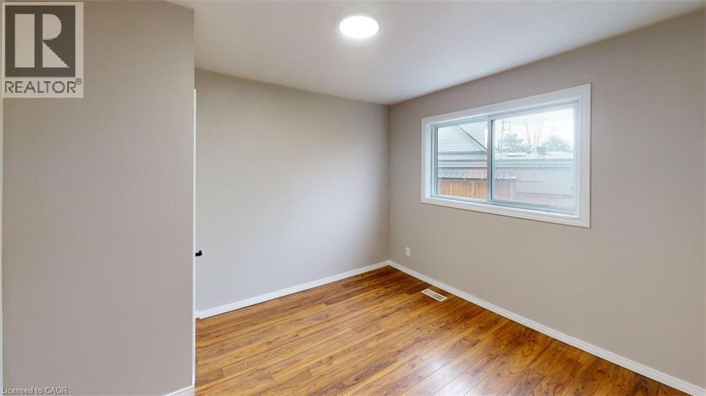 Bedroom 1 - 24 Burn Place, Kitchener, ON - Indoor Photo Showing Other Room