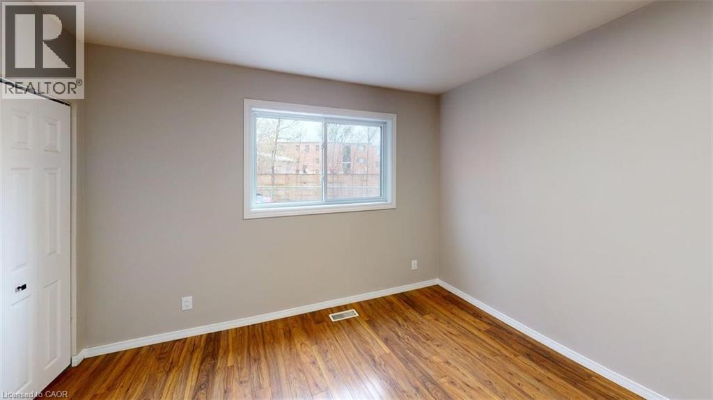 Bedroom 2 - 24 Burn Place, Kitchener, ON - Indoor Photo Showing Other Room