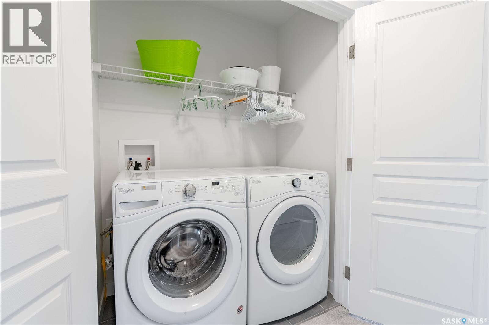 219 Newton Link, Saskatoon, SK - Indoor Photo Showing Laundry Room