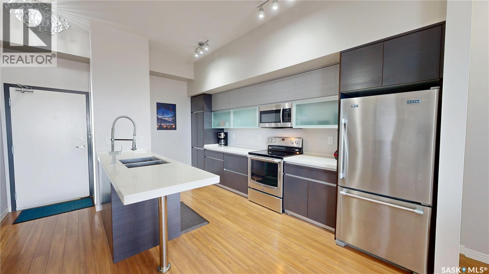 312 235 Evergreen Square, Saskatoon, SK - Indoor Photo Showing Kitchen With Stainless Steel Kitchen With Double Sink
