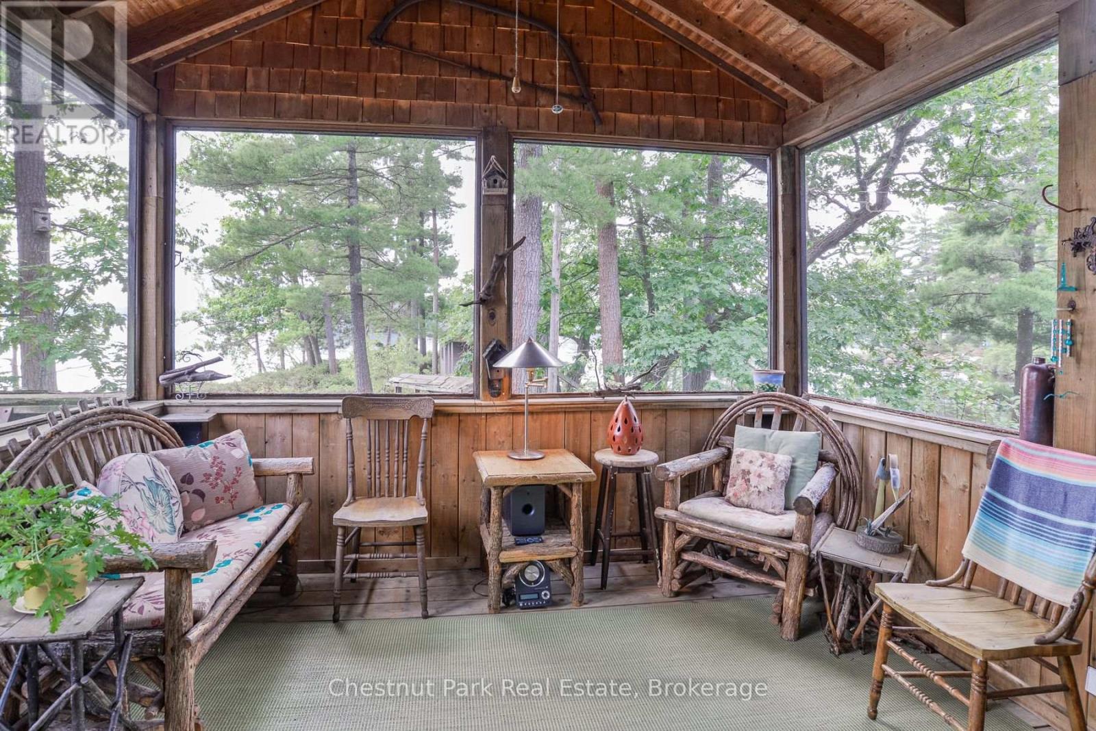 Screened porch off dining room - 1 Rose Island, Gravenhurst (Morrison), ON - With Deck Patio Veranda With Exterior