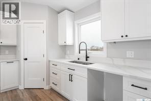 10 Jesse Bay, Last Mountain Lake, SK - Indoor Photo Showing Kitchen With Double Sink