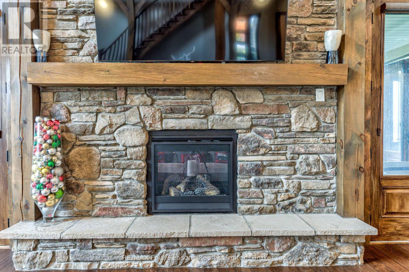 9 Windrose Valley Boulevard, Clearview, ON - Indoor Photo Showing Living Room With Fireplace