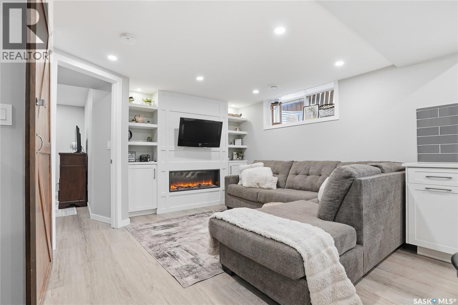 416 Golden Willow Way, Warman, SK - Indoor Photo Showing Other Room With Fireplace