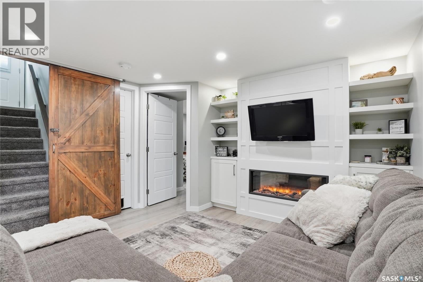 416 Golden Willow Way, Warman, SK - Indoor Photo Showing Living Room With Fireplace