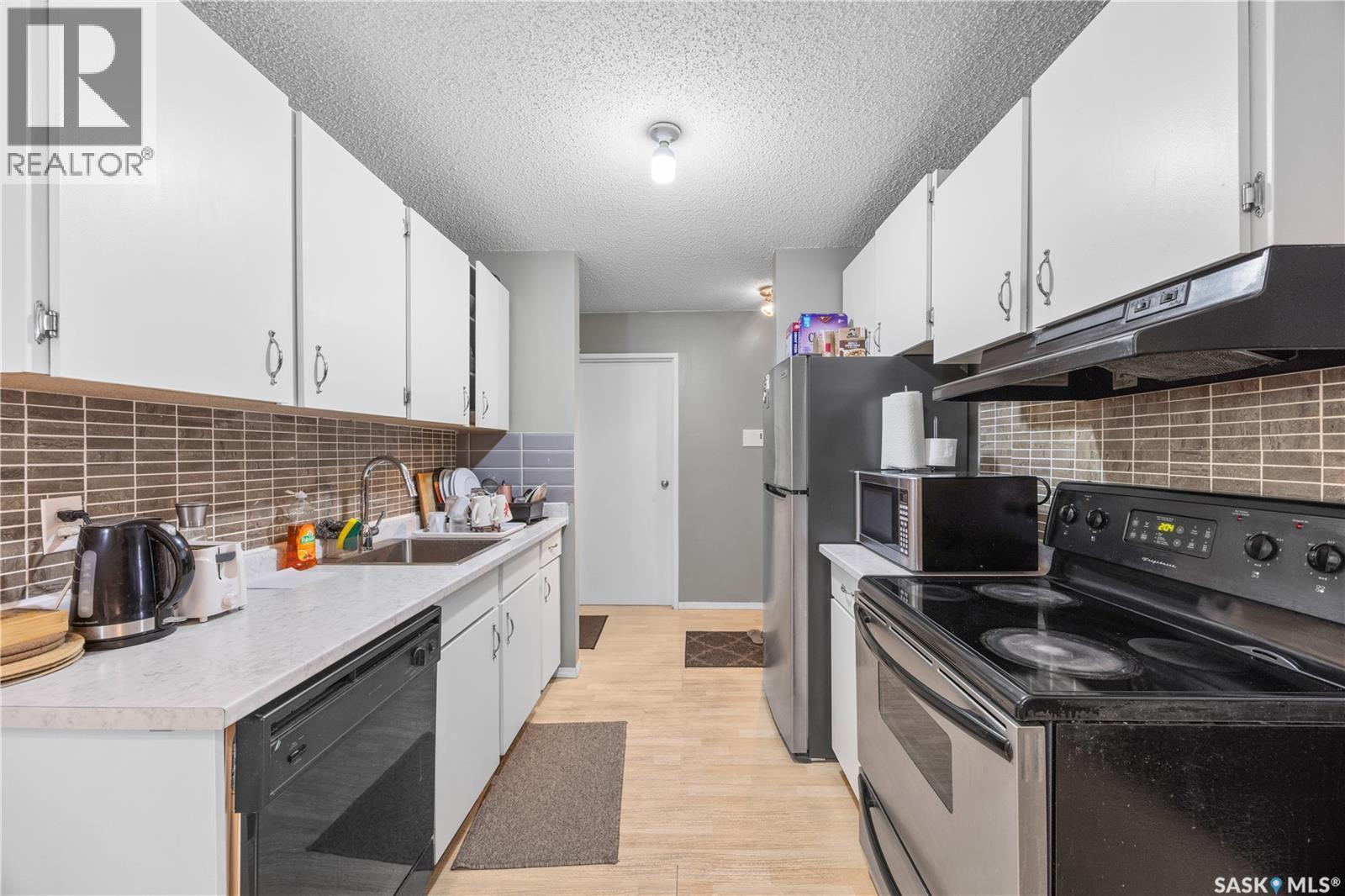 236 310 Stillwater Drive, Saskatoon, SK - Indoor Photo Showing Kitchen