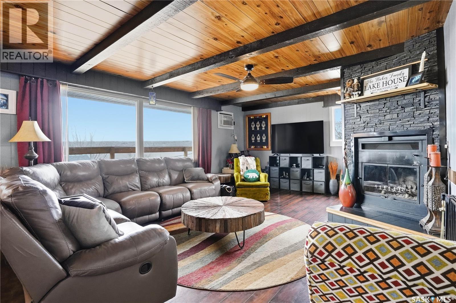 608 Aurora Street, Saskatchewan Beach, SK - Indoor Photo Showing Living Room With Fireplace