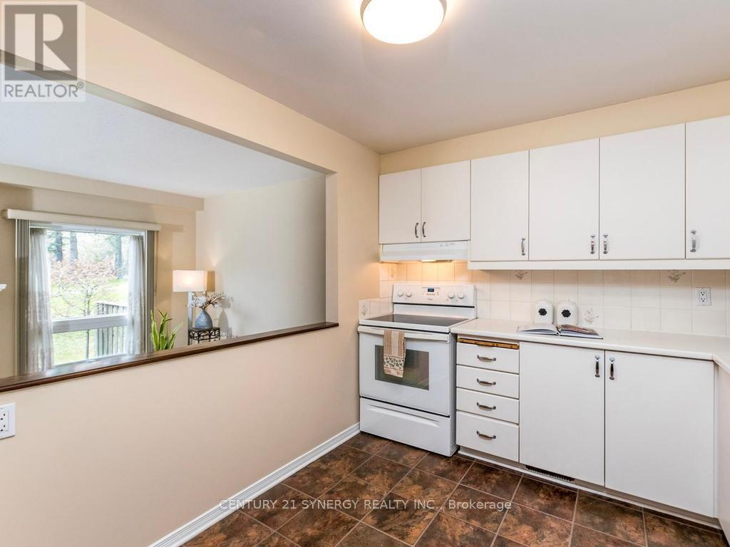 Kitchen with fridge,stove,dishwasher included. - 80 - 22C Maple Ridge Crescent, Ottawa, ON - Indoor Photo Showing Kitchen