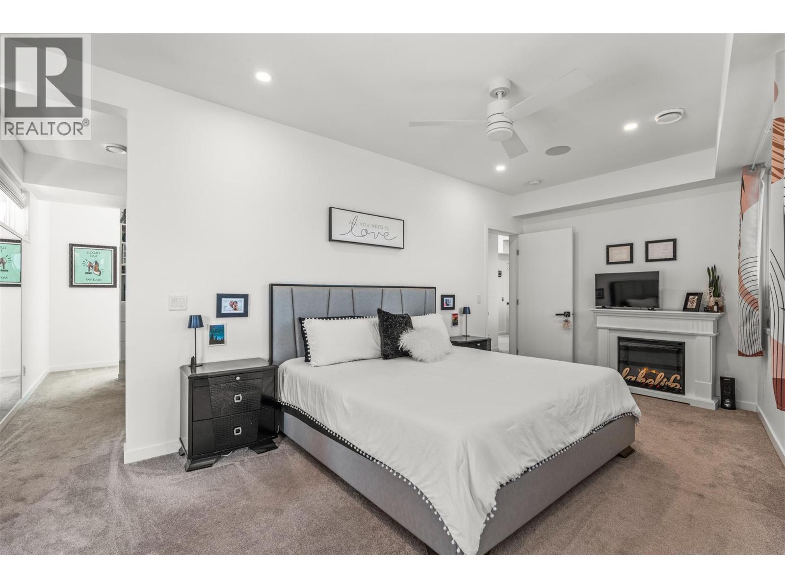 Primary bedroom - 7938 Graystone Drive, Coldstream, BC - Indoor Photo Showing Bedroom