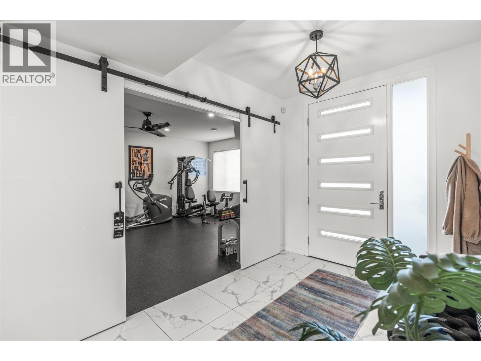 7938 Graystone Drive, Coldstream, BC - Indoor Photo Showing Gym Room