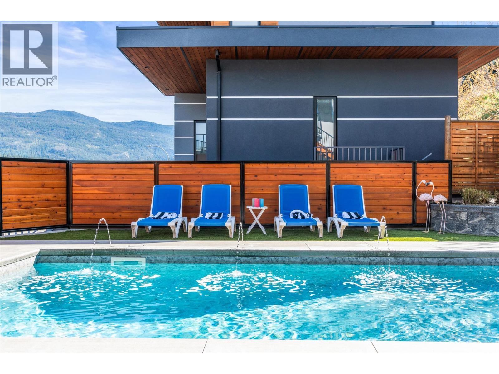 7938 Graystone Drive, Coldstream, BC - Outdoor With In Ground Pool