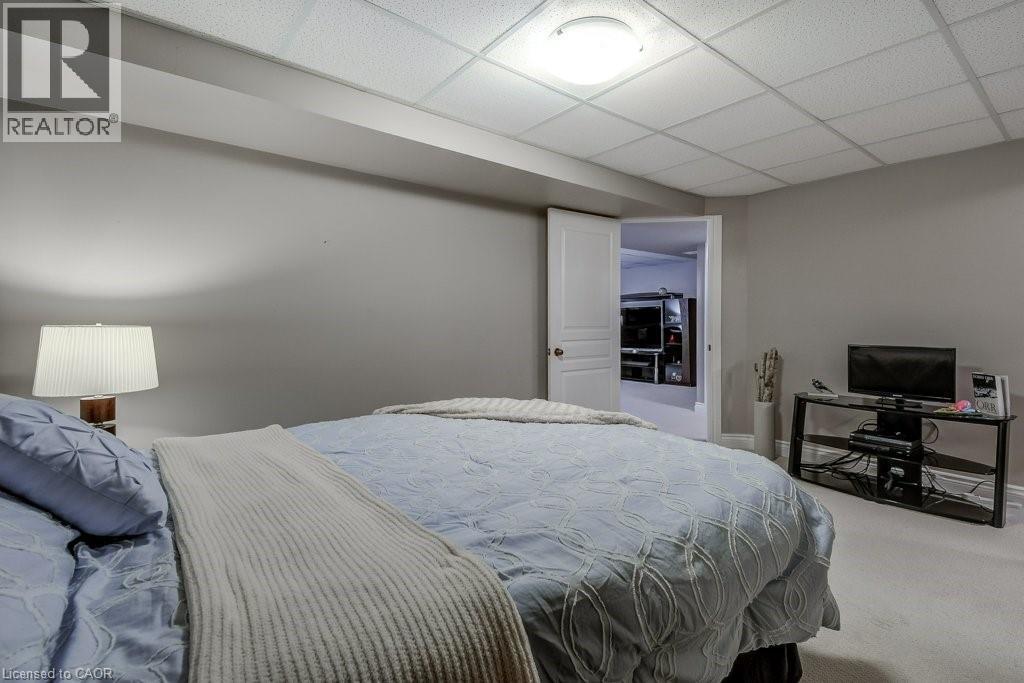 Recessed drop ceiling with integrated lighting - 605 Welland Avenue Unit# 21, St. Catharines, ON - Indoor Photo Showing Bedroom