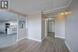 Light wood-finish flooring throughout the space - 