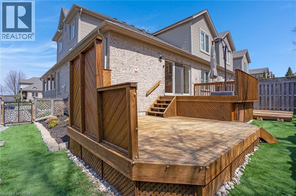Multi-level wood deck with lattice skirting and integrated stairs - 227 Chestnut Hill Crescent, Kitchener, ON - Outdoor With Deck Patio Veranda With Exterior