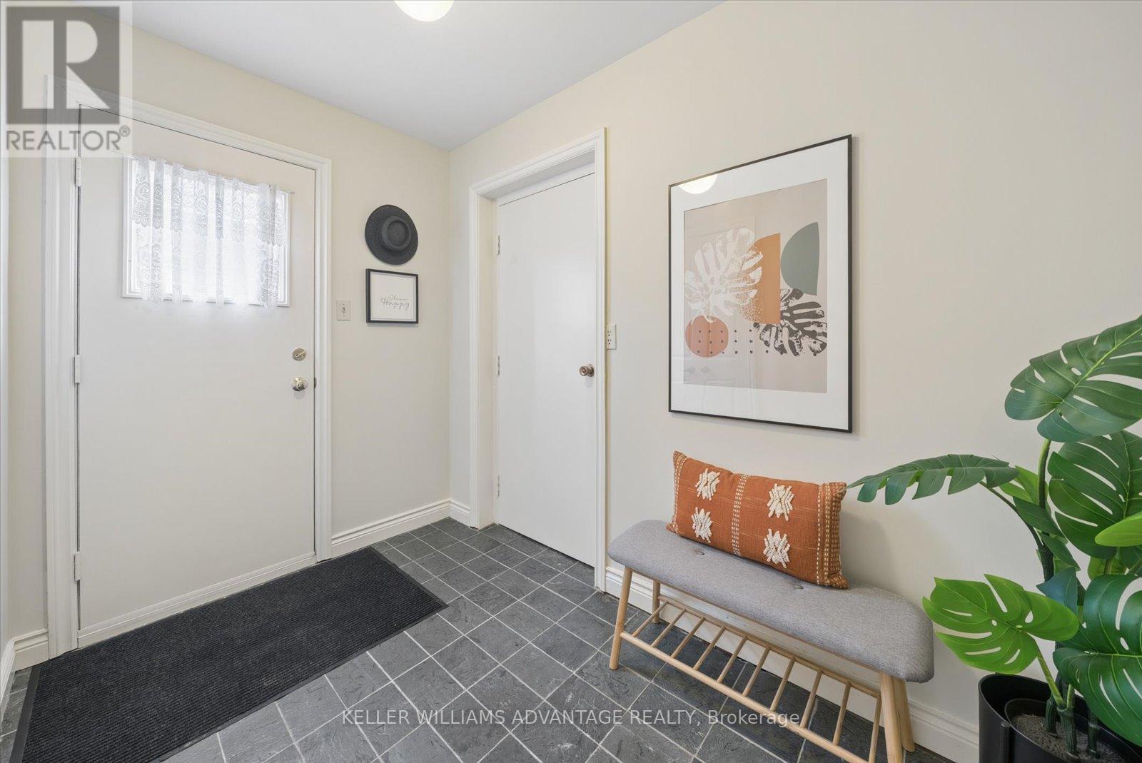 Mudroom entry into garage - 72 Bonacres Avenue, Toronto, ON