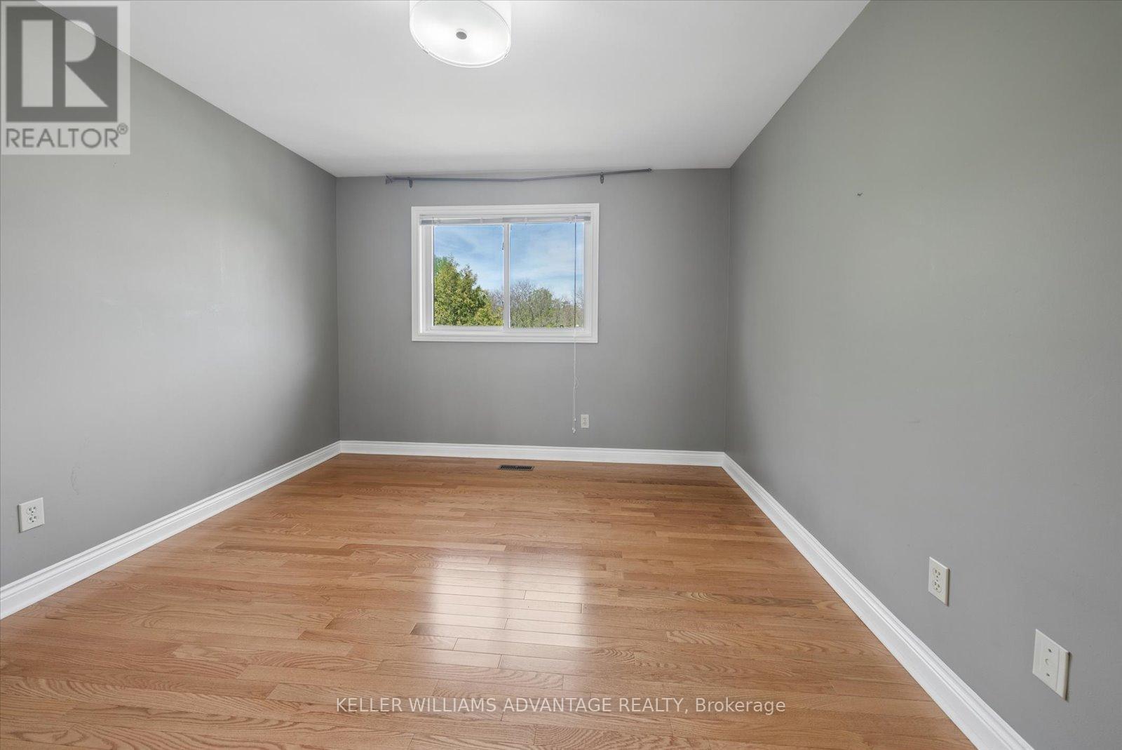 Bedroom 2 with hardwood & double closet - 72 Bonacres Avenue, Toronto, ON