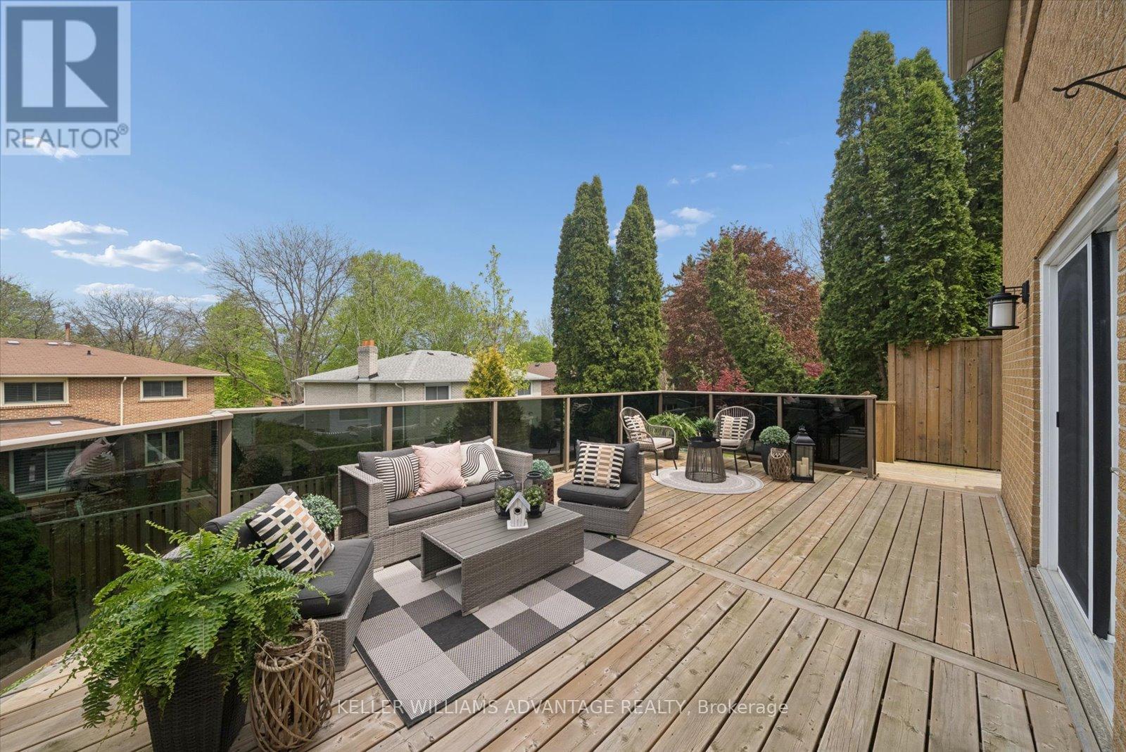 Double with deck with glass panel railings - 72 Bonacres Avenue, Toronto, ON