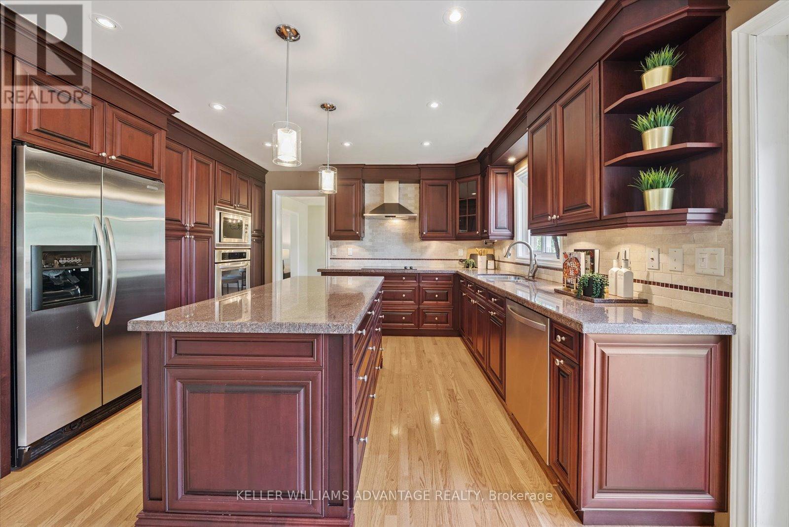 Large island & plenty of counter space - 72 Bonacres Avenue, Toronto, ON